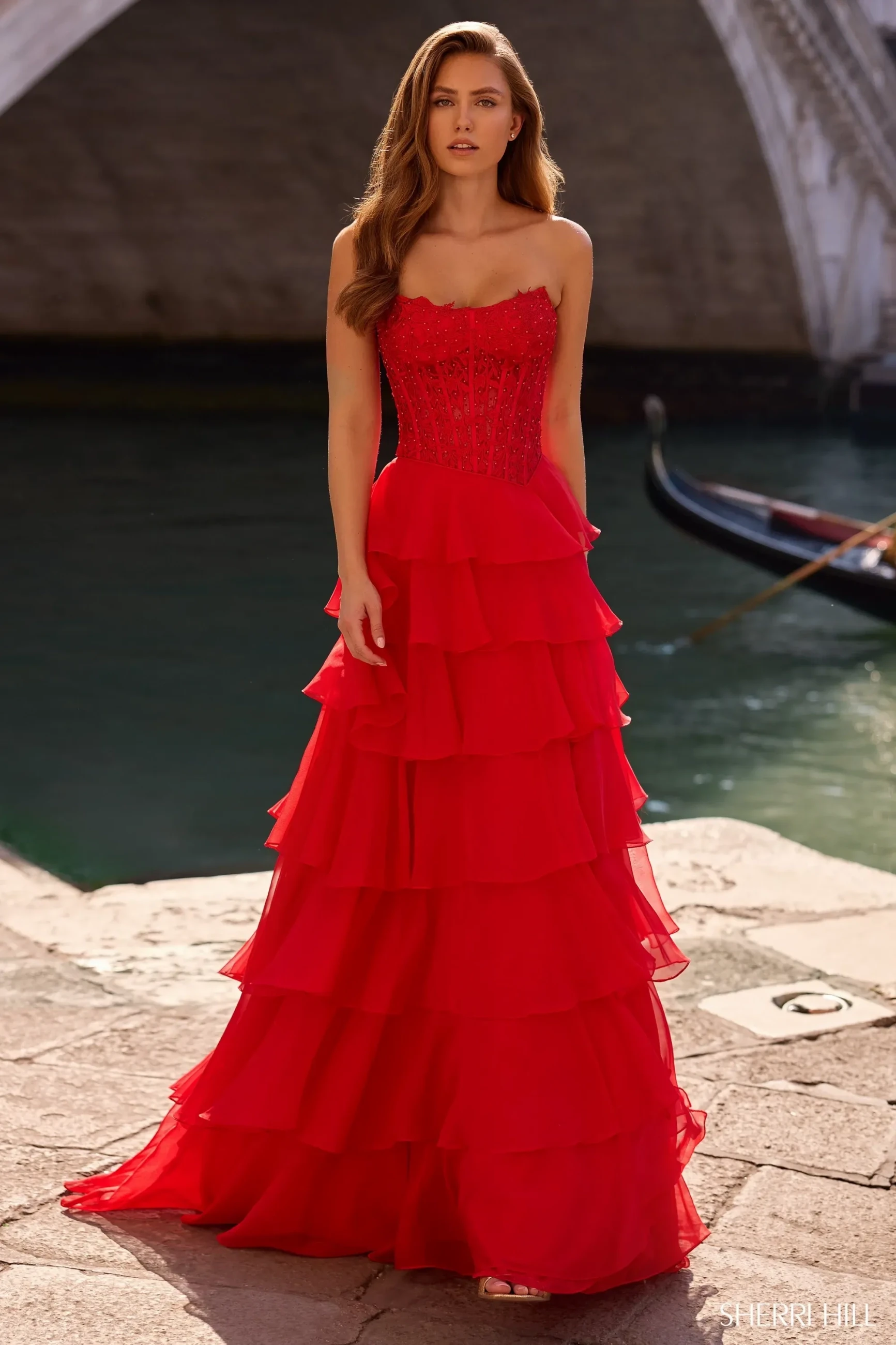 Model wearing a gown by Sherri Hill