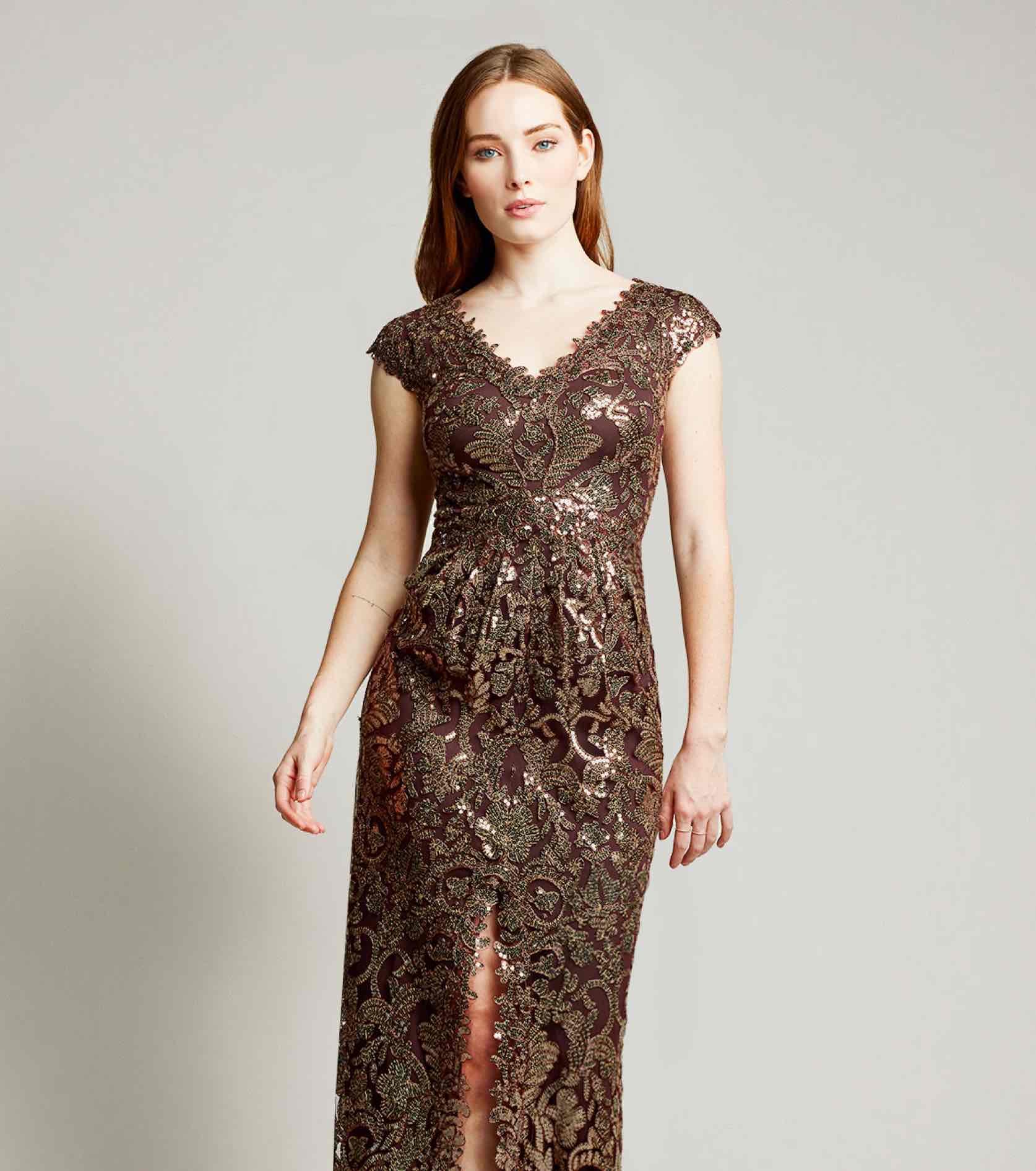 Model in shiny copper Tadashi Shoji gown