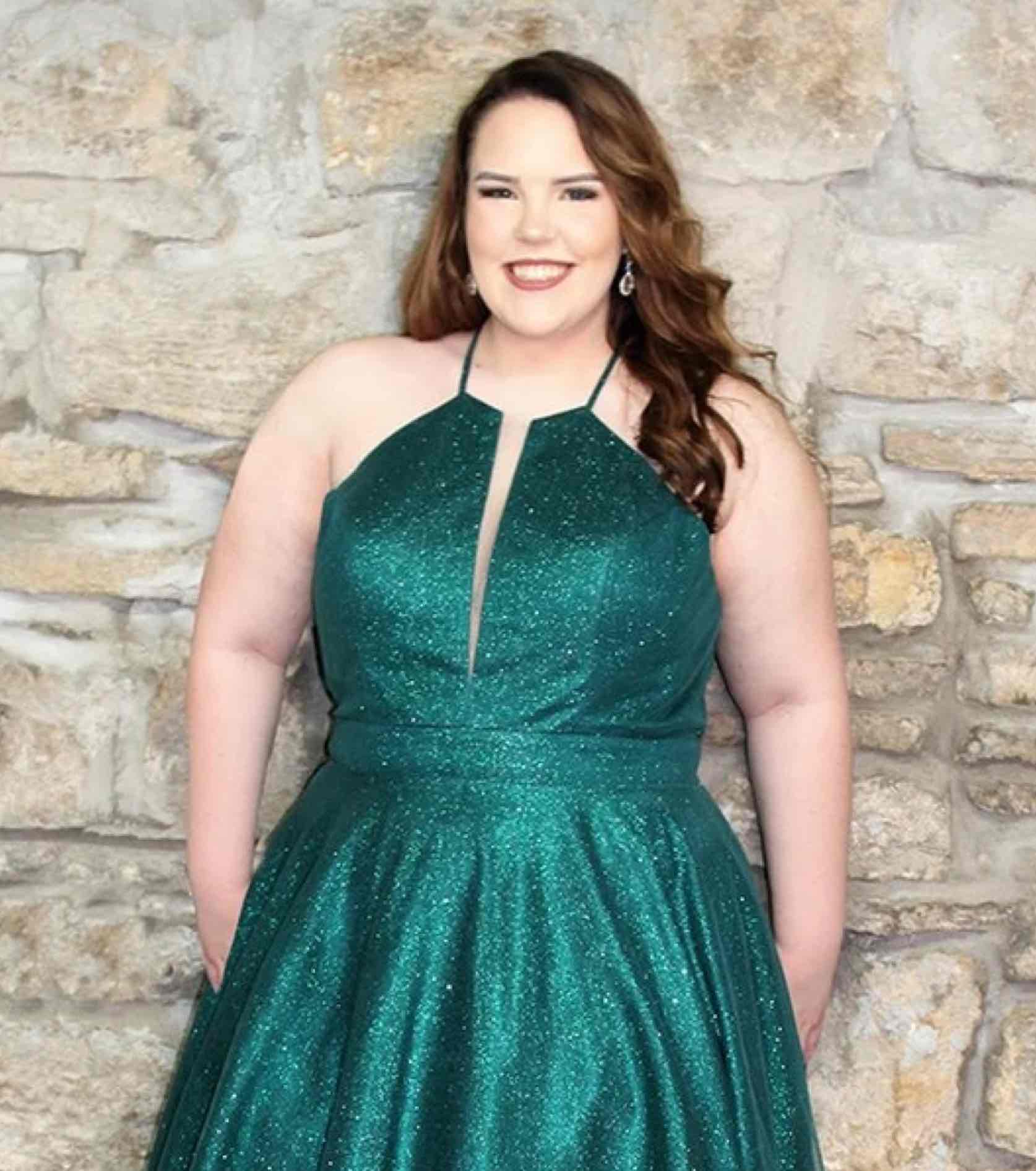 Model in sparkly green Sydney's Closet dress