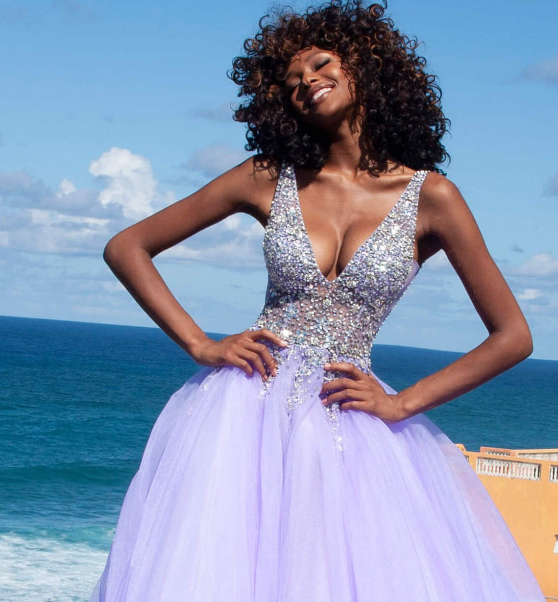 Model in purple ballgown Jovani dress